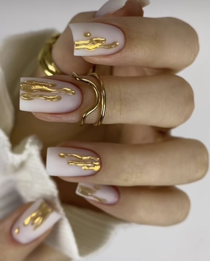 Matte White with Gold Drip Accents Matte White with Gold Drip Accents — Winter Nail Colors for Pale Skin