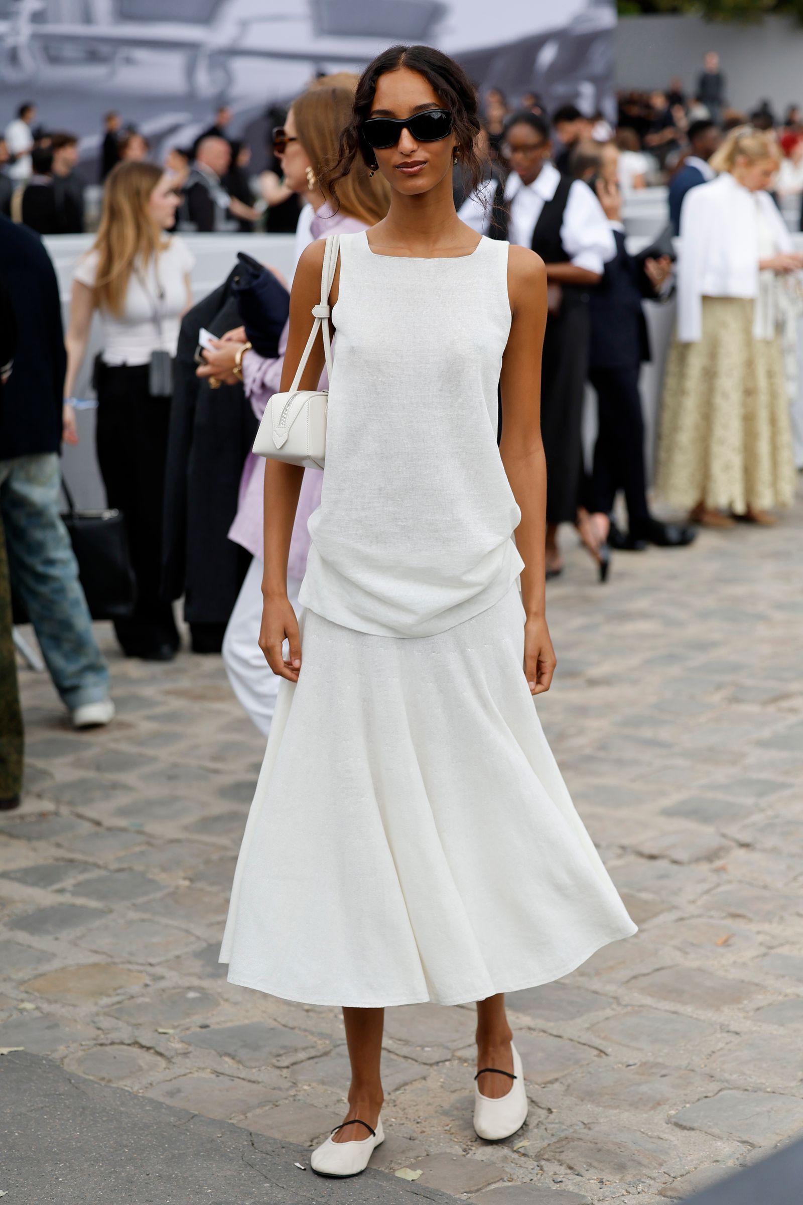 Sleeveless White Top and Asymmetrical Draped Skirt Sleeveless White Top and Asymmetrical Draped Skirt — Winter White Outfits