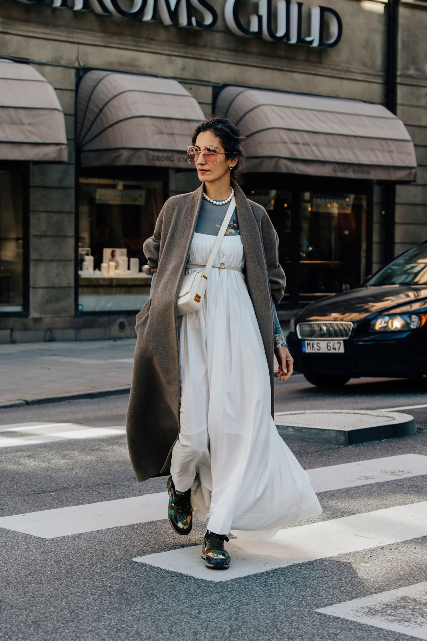 Brown Knit Cardigan Over a White Maxi Dress and Patterned Boots Brown Knit Cardigan Over a White Maxi Dress and Patterned Boots — Winter to Spring Transition Outfits