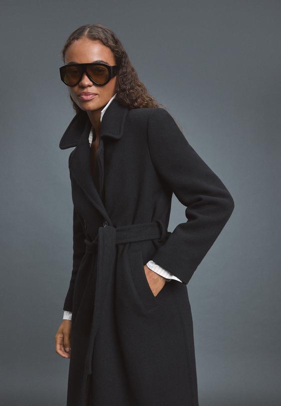 Classic Black Belted Coat Over White Shirt Classic Black Belted Coat Over White Shirt — Winter Outfits for Black Girls
