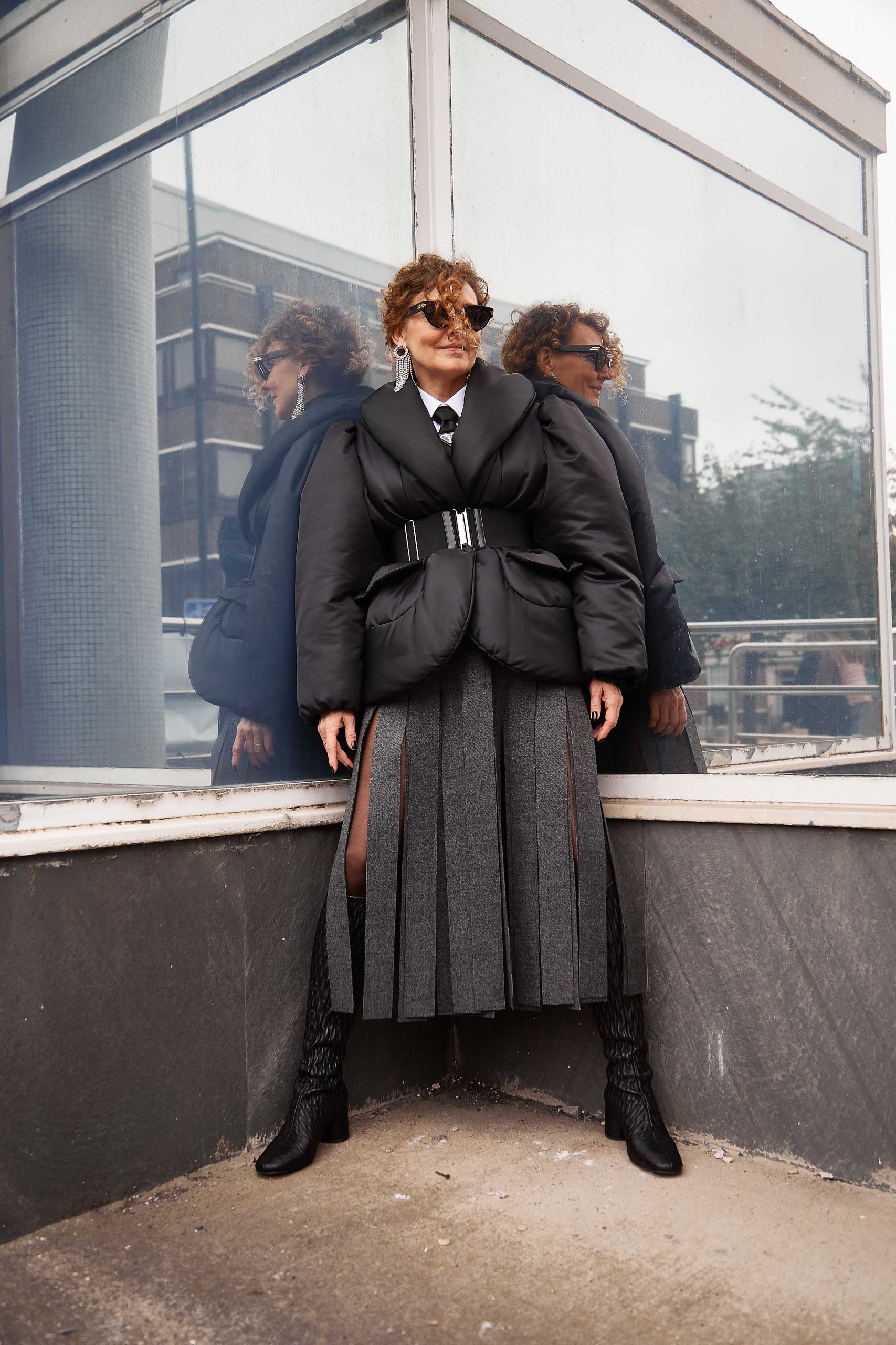 Dramatic Puffer Jacket and Pleated Skirt for a Fashion-Forward Statement Dramatic Puffer Jacket and Pleated Skirt for a Fashion-Forward Statement — Winter Outfits for Women Over 40