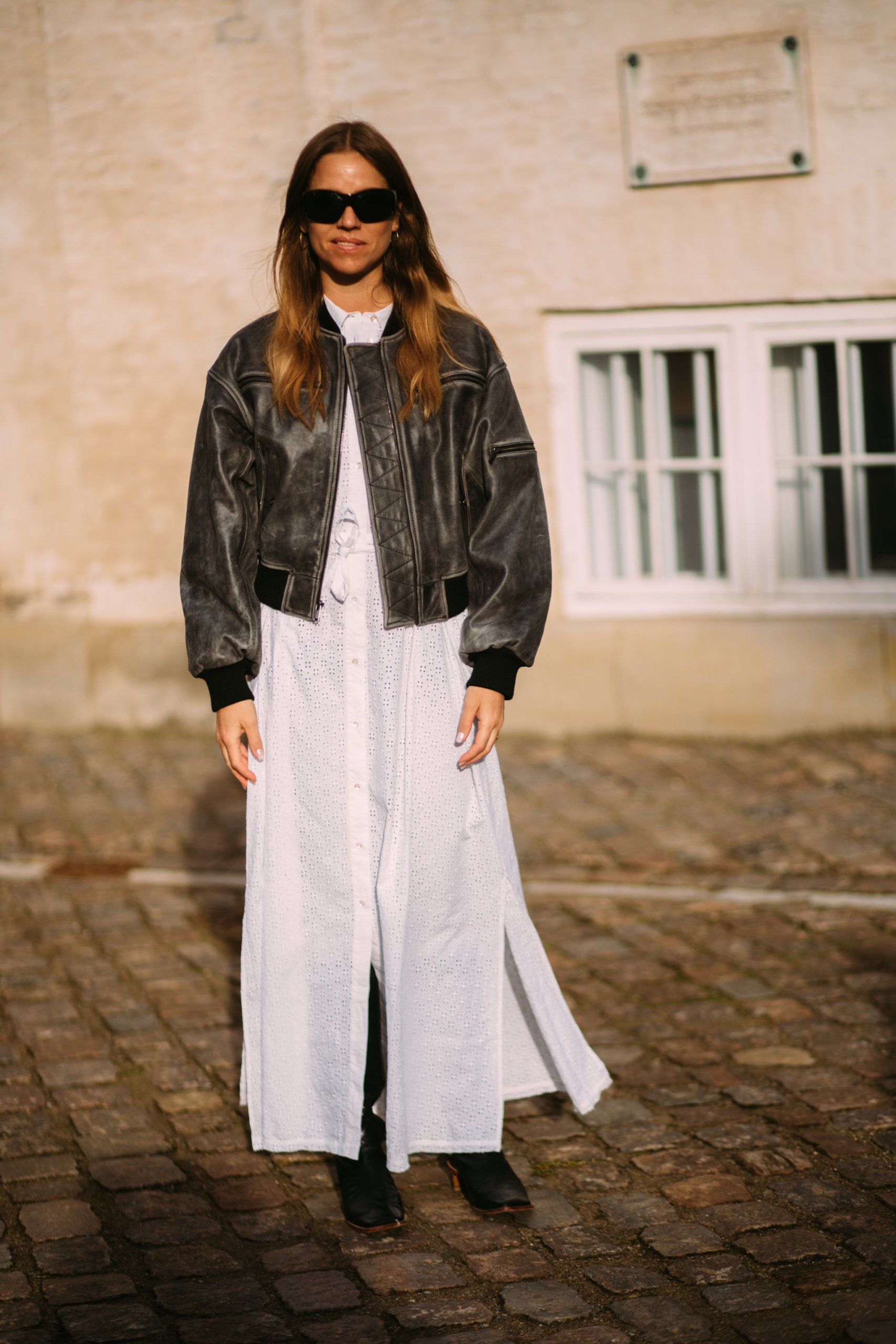 Grey Leather Bomber Jacket Over an Eyelet Midi Dress Grey Leather Bomber Jacket Over an Eyelet Midi Dress — Winter to Spring Transition Outfits