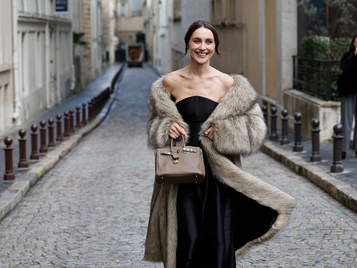Black Strapless Dress with Voluminous Faux Fur Coat Black Strapless Dress with Voluminous Faux Fur Coat — Winter Wedding Guest Outfits