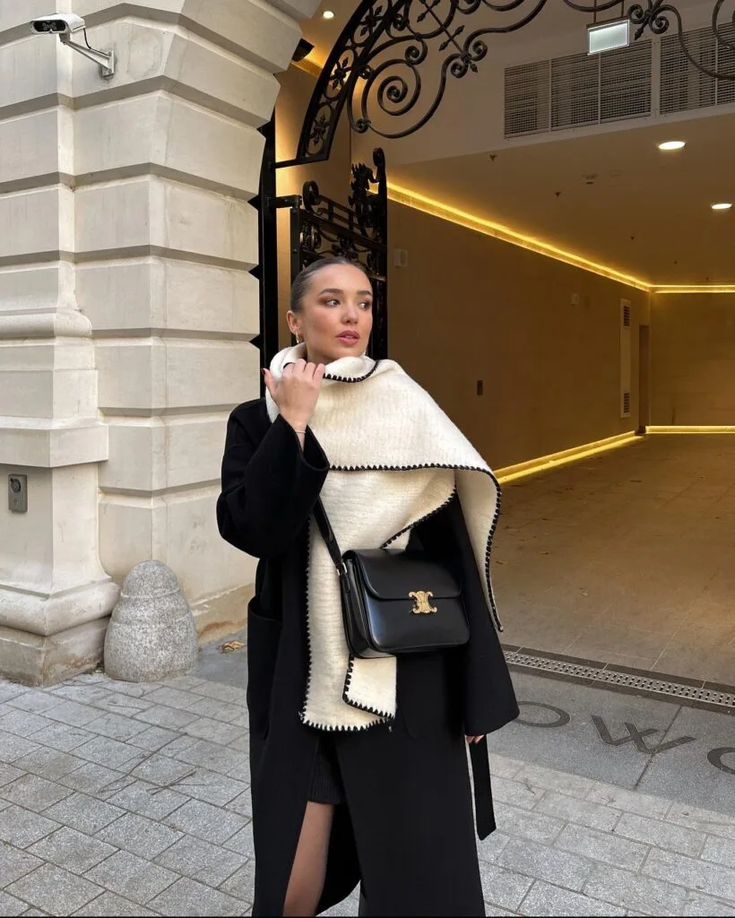 Black Coat with Cream-Trimmed Scarf: Elegant Evening Winter Black Coat with Cream-Trimmed Scarf: Elegant Evening Winter — Old Money Winter Outfits