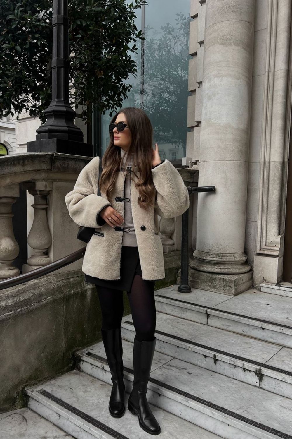 Outfit Idea — A Woman Stands On Steps In A City Outfit Idea — A Woman Stands On Steps In A City — Europe Winter Outfits