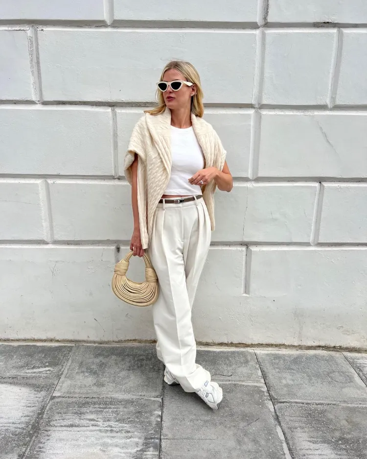 Cream Cable-Knit Sweater Vest with White Trousers and Sneakers Cream Cable-Knit Sweater Vest with White Trousers and Sneakers — Italy Winter Outfits