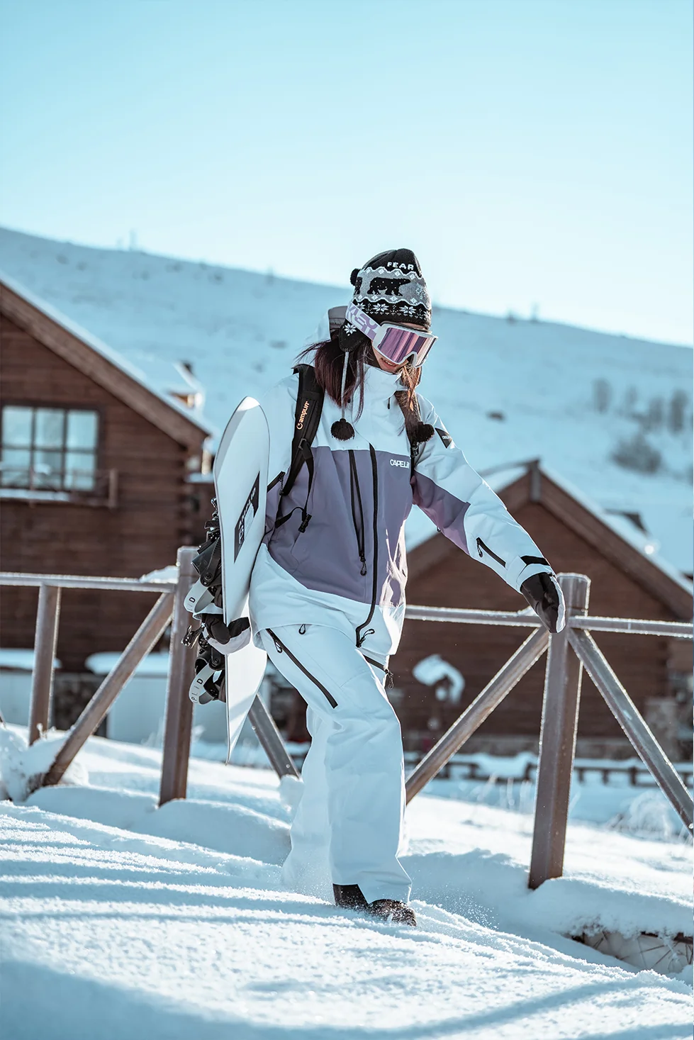 Color-Blocked Chic: White and Purple Jacket Paired with White Snow Pants — Snowboarding Outfits