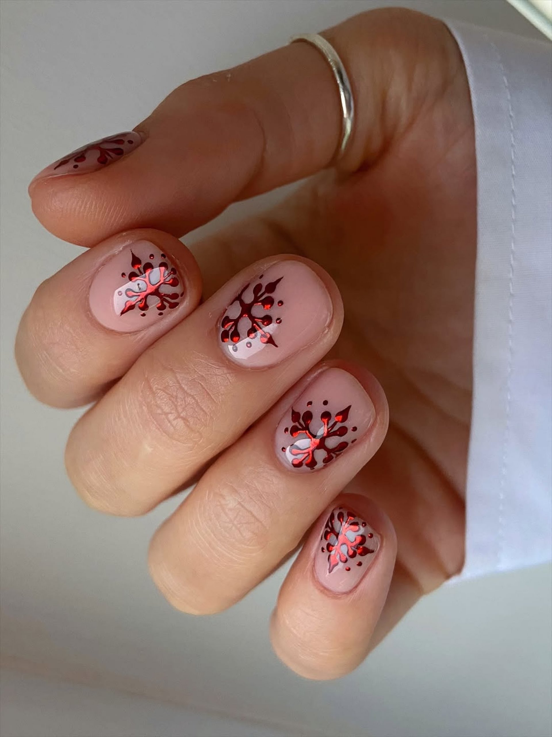 Sheer Nude Squovals with Red Snowflake Decals Sheer Nude Squovals with Red Snowflake Decals — Winter Squoval Nails