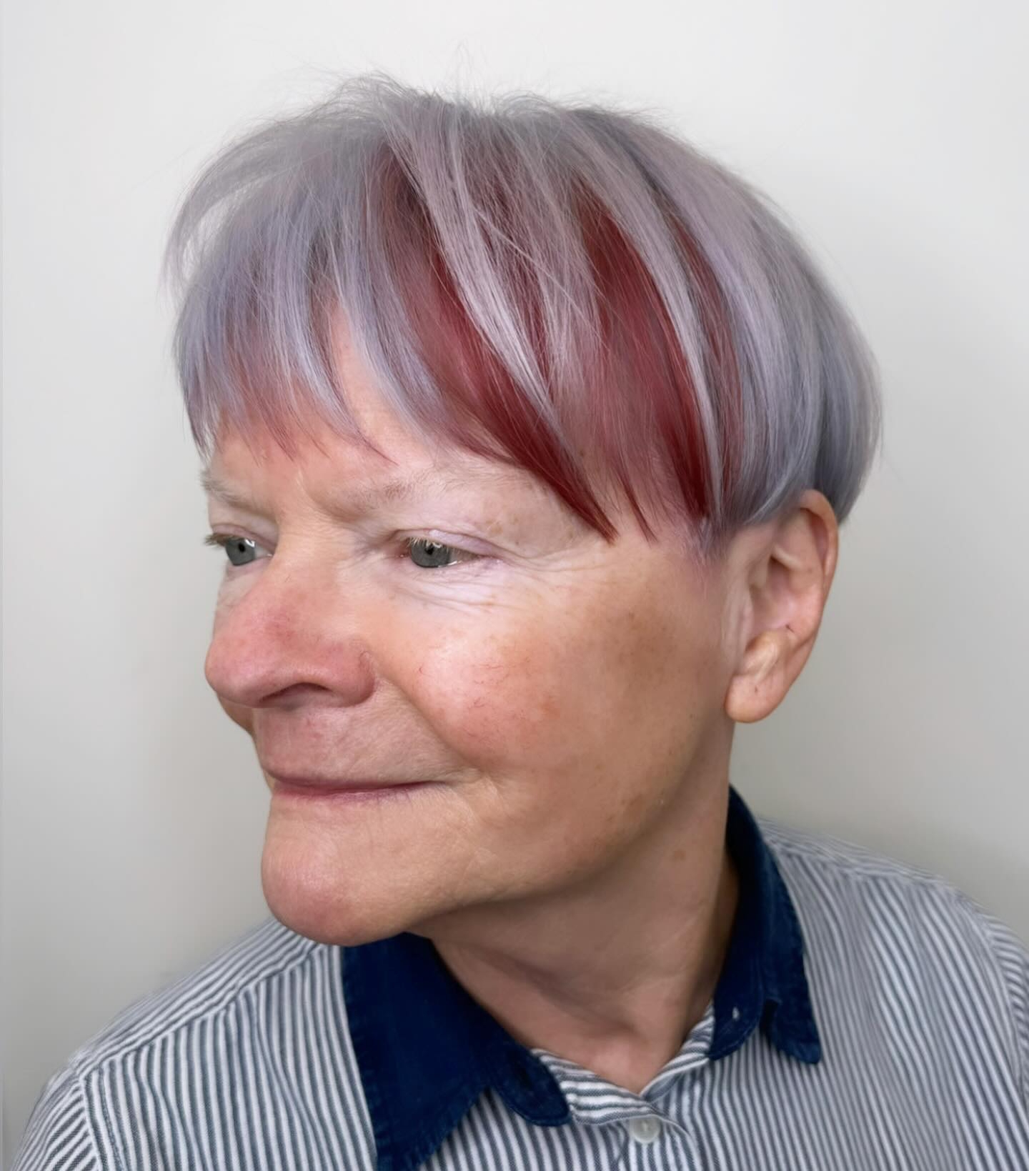 Silver with Vibrant Red Streaks Silver with Vibrant Red Streaks — Winter Hair Colors for Women Over 70