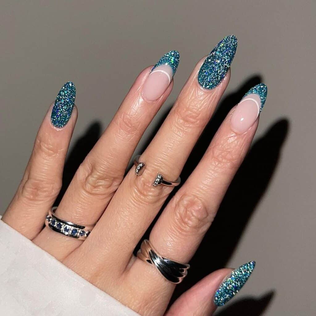 Teal Glitter French Tips on Long Almond Teal Glitter French Tips on Long Almond — New Years Nails 2027