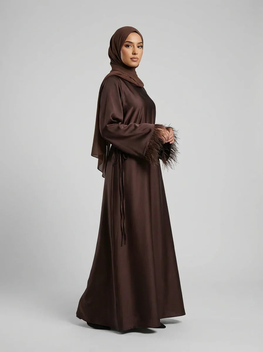 Elegant Deep Brown Satin Abaya with Feathered Cuffs Elegant Deep Brown Satin Abaya with Feathered Cuffs — Modest Winter Outfits