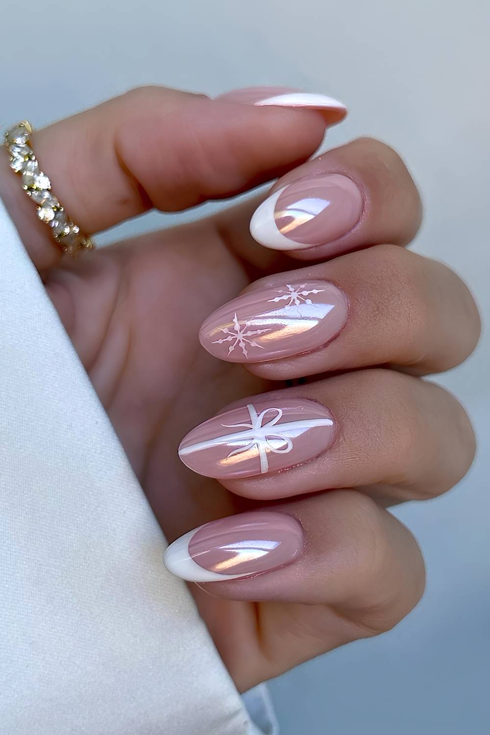 Sheer Pink Pearlescent Almonds with Ribbon Sheer Pink Pearlescent Almonds with Ribbon — Subtle Christmas Nails 2026