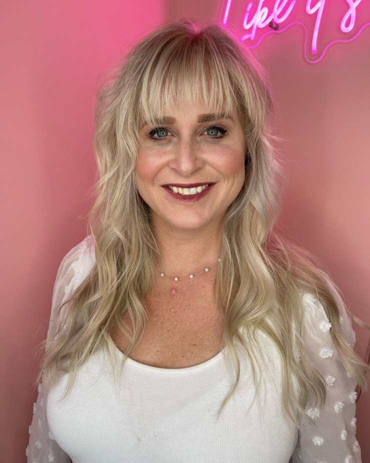 Collarbone Shag With Bangs — Winter Haircuts for Women Over 40