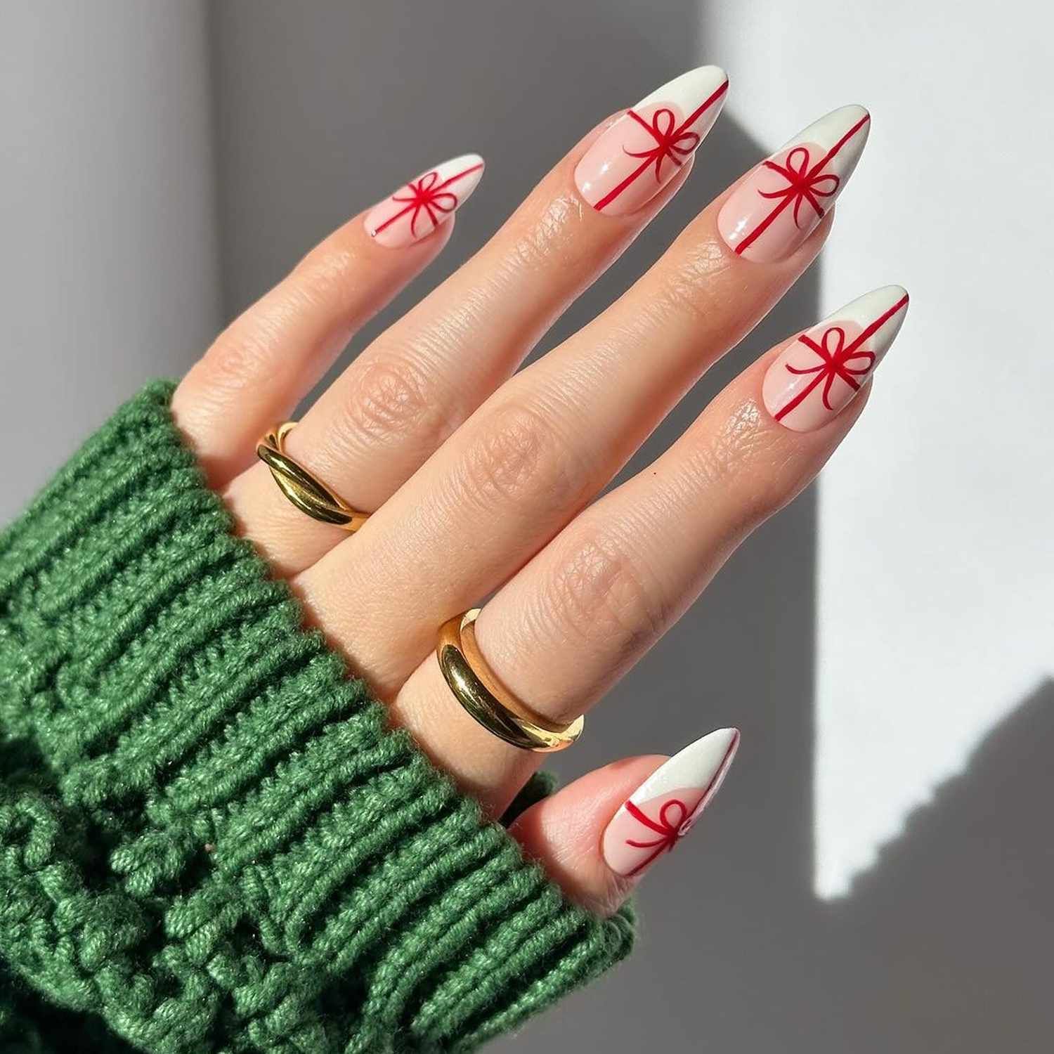 Nude French with Red Ribbon Gift Design Nude French with Red Ribbon Gift Design — Christmas Nails 2026