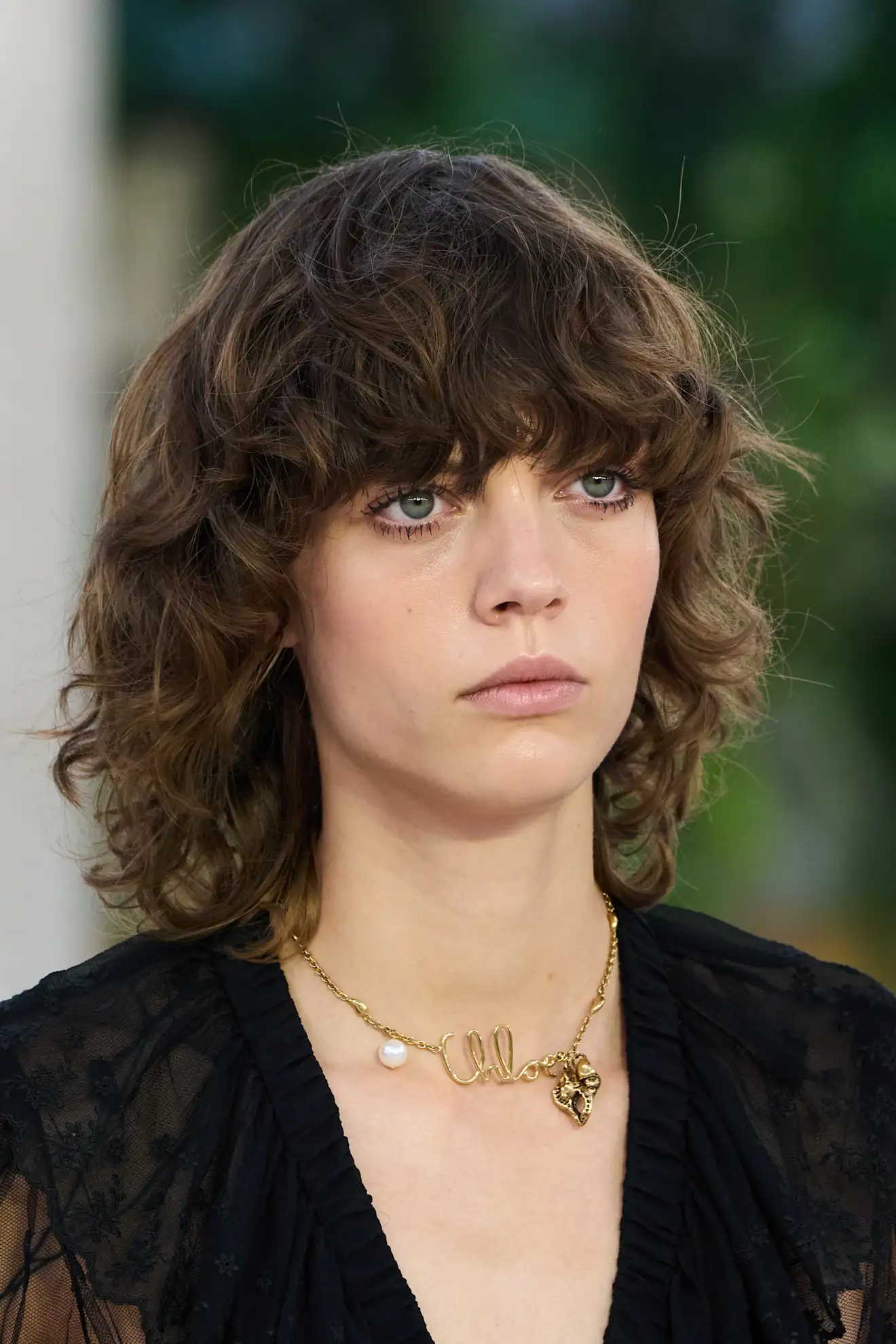 Voluminous Curly Shag With Short Bangs Voluminous Curly Shag With Short Bangs — Winter Natural Hairstyles
