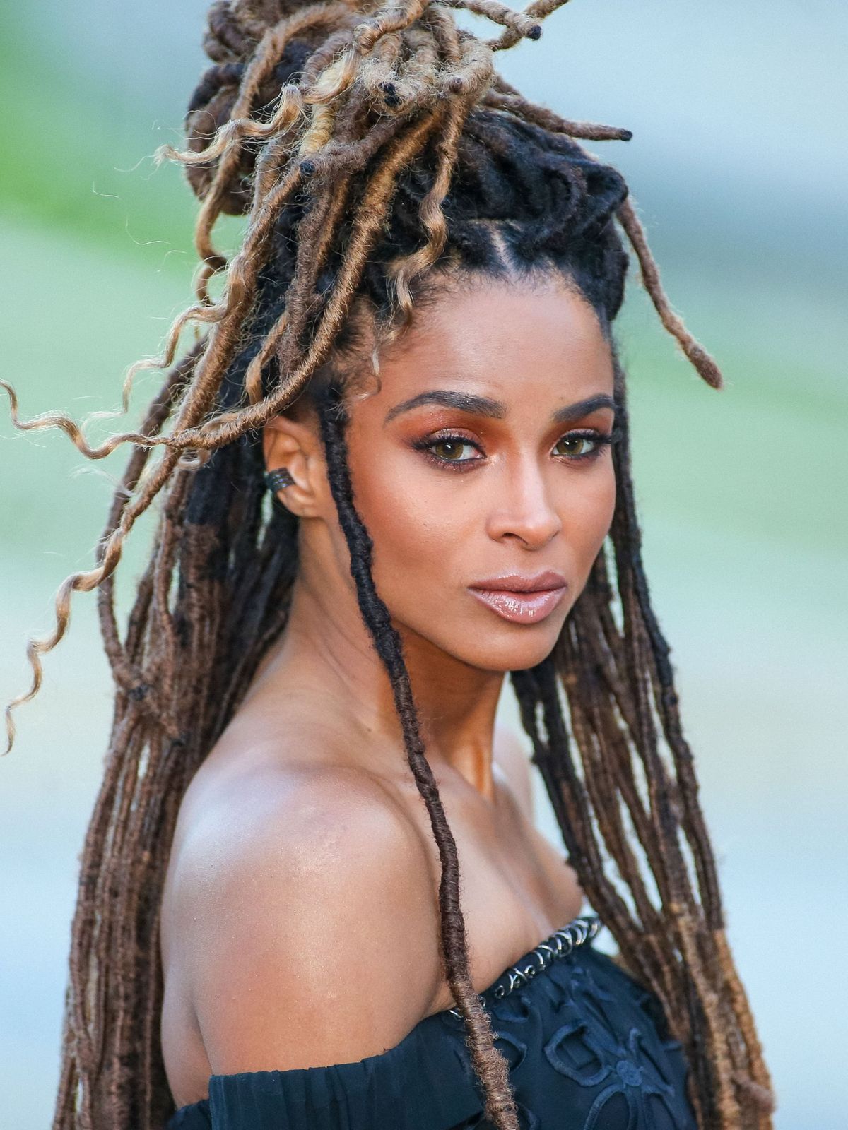 Intricate Updo for Coily Locs Intricate Updo for Coily Locs — Winter Hairstyles for Long Hair