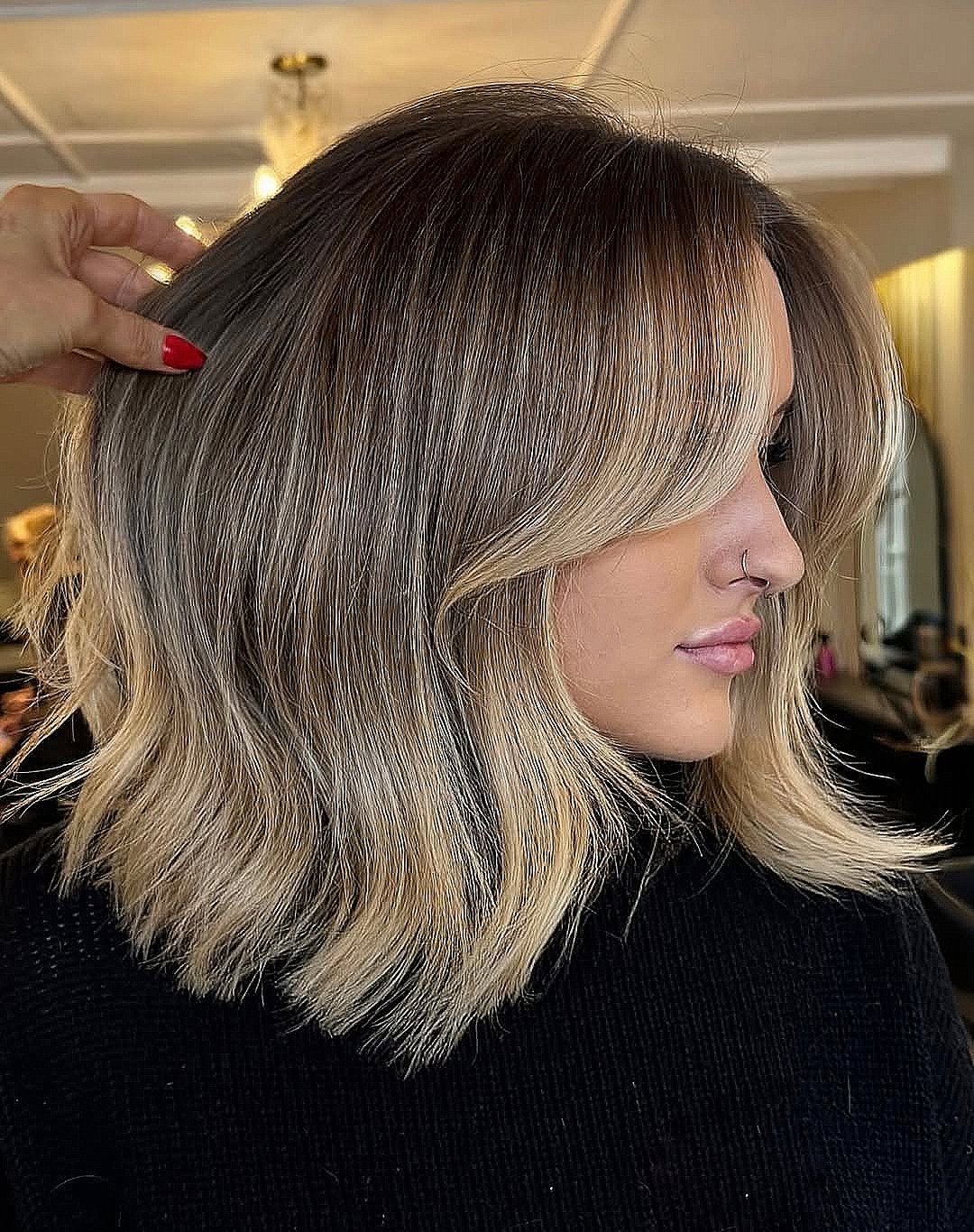 Blonde Balayage on Wavy Bob with Curtain Bangs Blonde Balayage on Wavy Bob with Curtain Bangs — Reverse Balayage