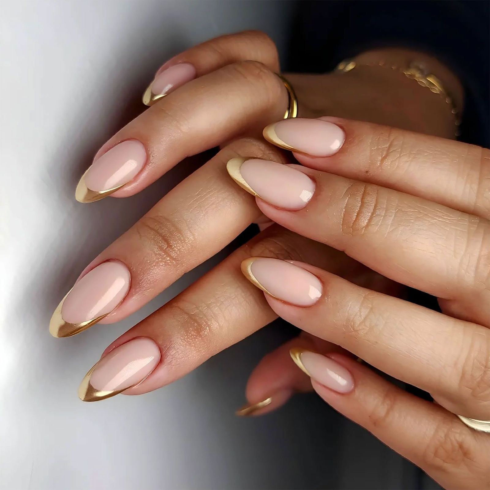 Gold almond nails are the most elegant manicure for Christmas and New Year 2025 | Glamour UK