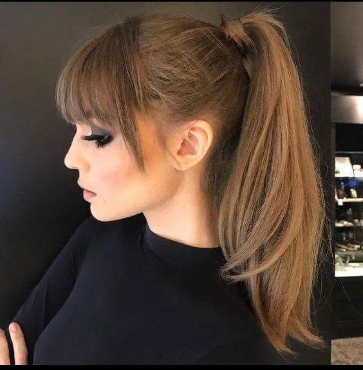 Sleek High Ponytail With Full Bangs — Winter Hairstyles with Bangs