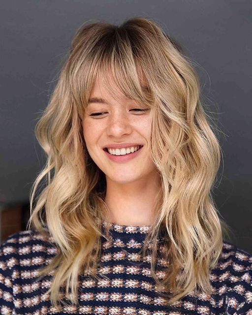 Light Blonde Lob With Full Bangs — Winter Haircuts for Oval Faces