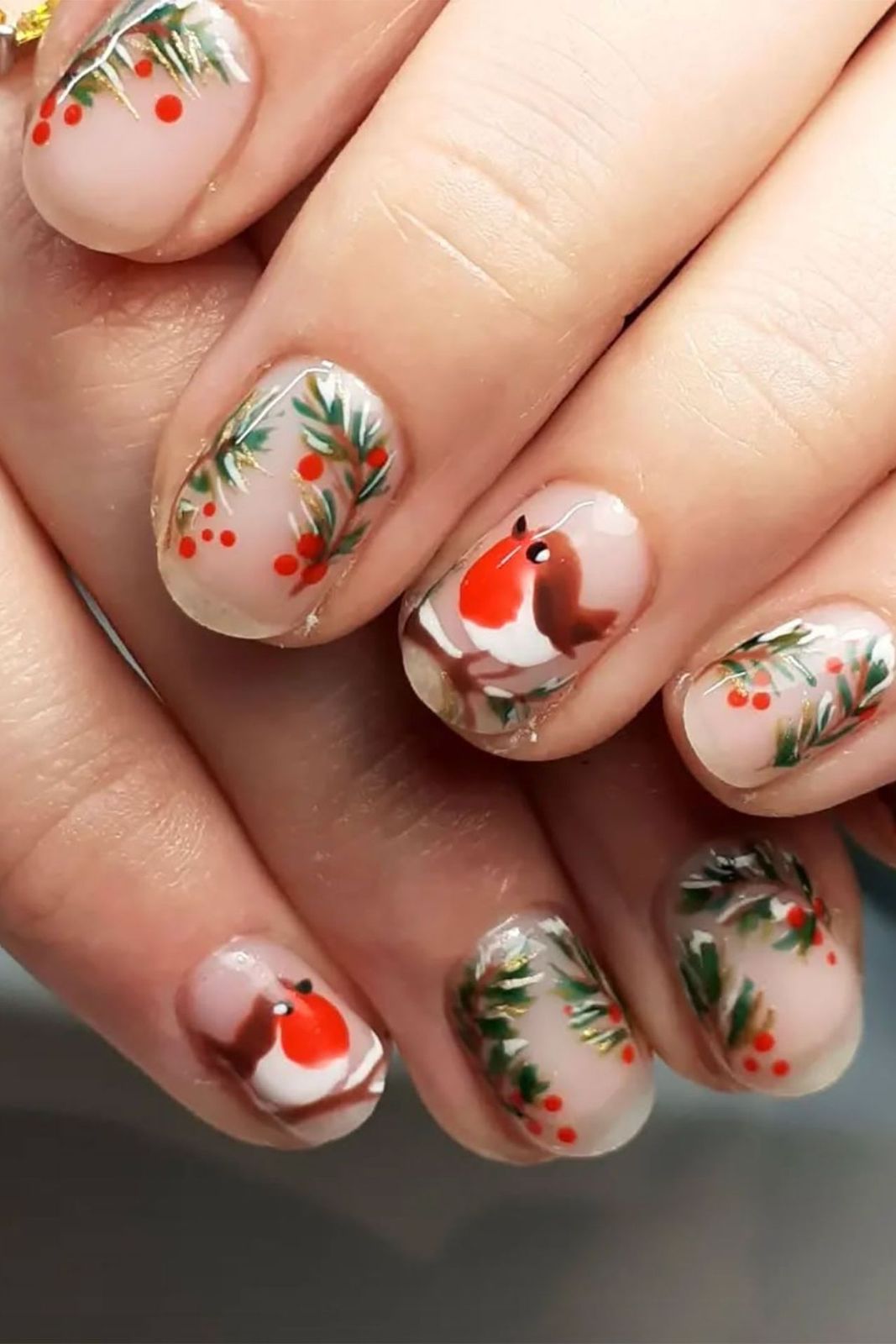 Robin and Holly Short Oval Nails Robin and Holly Short Oval Nails — Christmas Nail Designs 2026