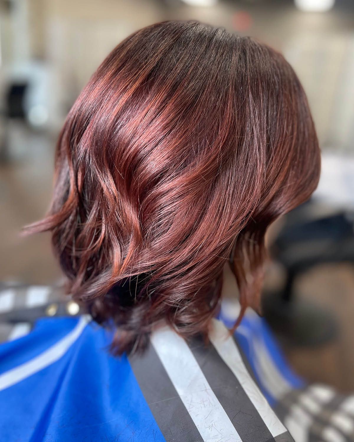 Deep Red Angled Bob — Winter Hair Colors for Short Hair