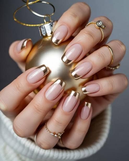 Winter french nail ideas with gold accents