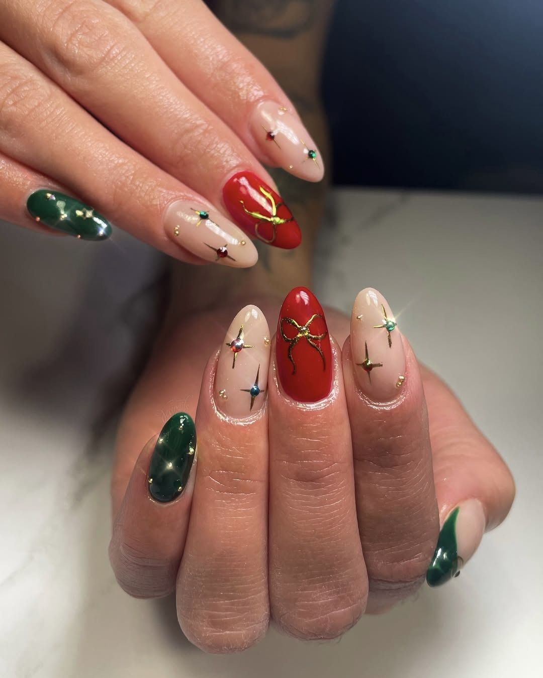 Nude Red Green Gold Bow Stud Nails Nude Red Green Gold Bow Stud Nails — Christmas Nail Colors 2026