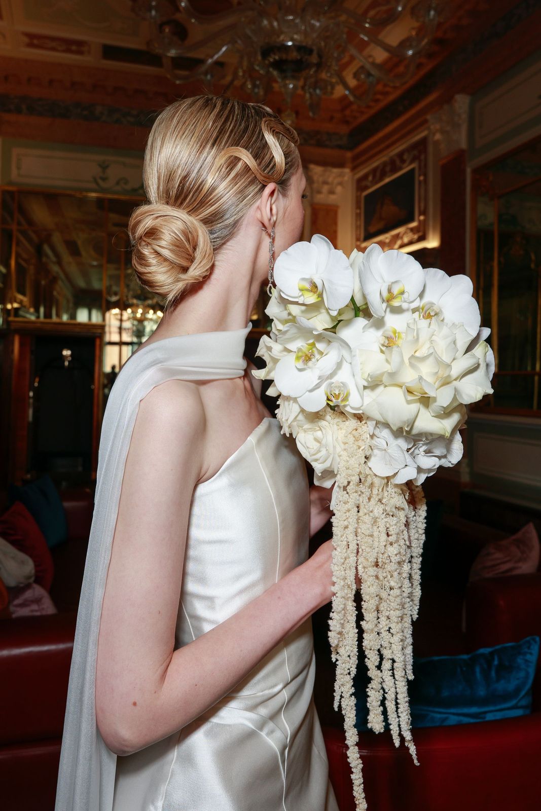 Chic Blonde Low Bun Updo — Winter Wedding Hairstyles