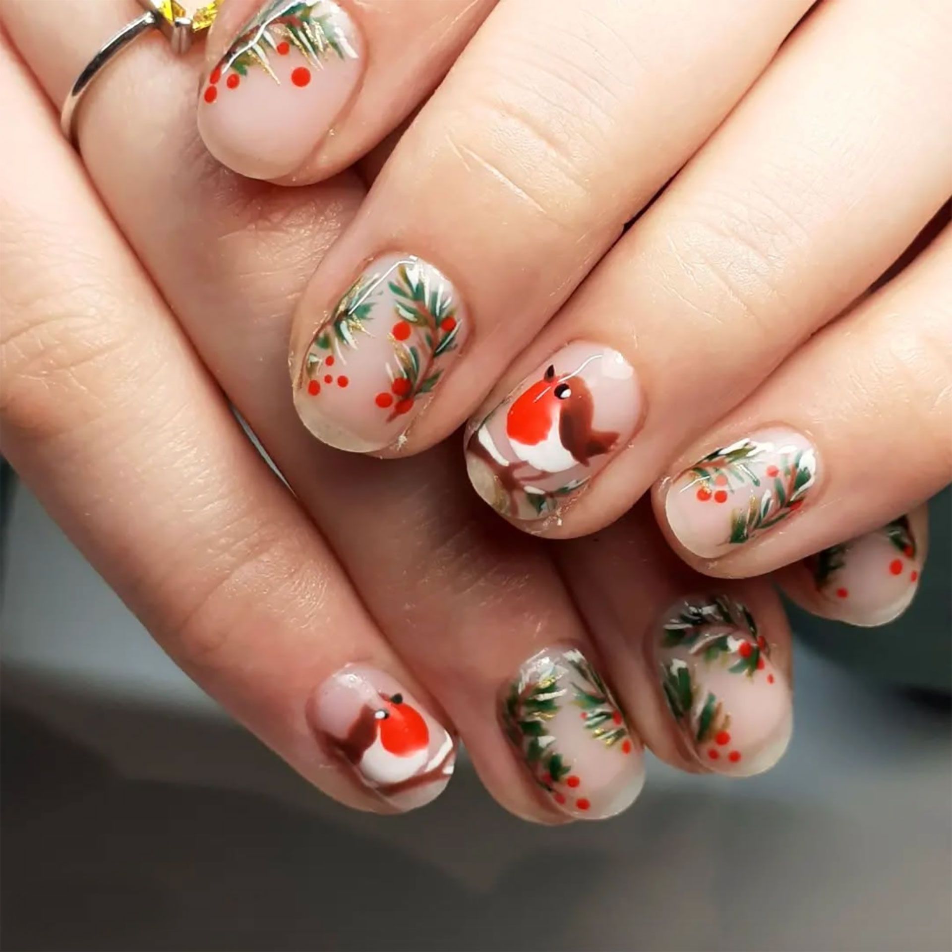 Short Oval Hand-Painted Robin and Holly Short Oval Hand-Painted Robin and Holly — Subtle Christmas Nails 2026