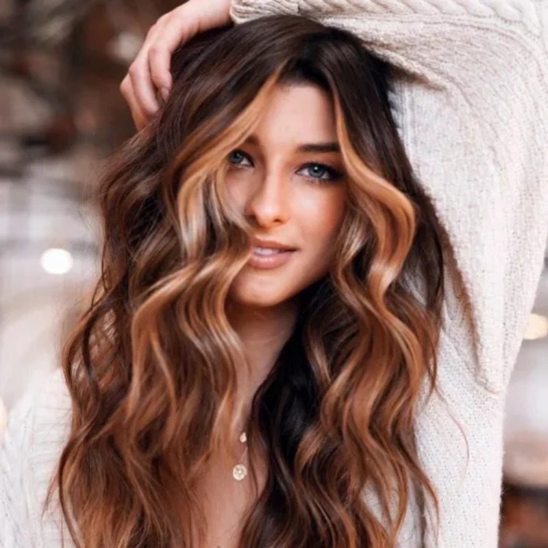 Wavy Blowout With Face-Framing Blonde Highlights Wavy Blowout With Face-Framing Blonde Highlights — Winter Hairstyles for Thick Hair