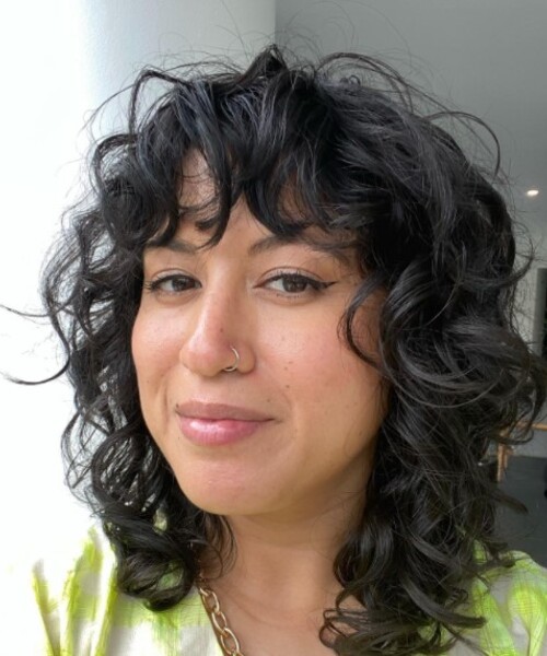 Textured Shag With Curly Bangs Textured Shag With Curly Bangs — Winter Haircuts for Curly Hair
