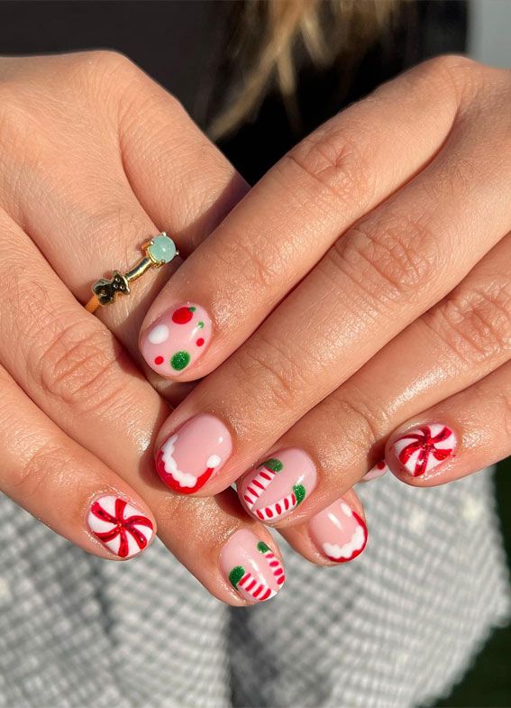 Pink with Peppermint and Candy Cane Designs Pink with Peppermint and Candy Cane Designs — Short Christmas Nails 2026