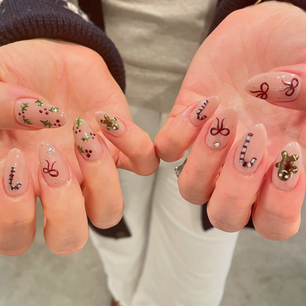 Variety of Christmas Motif Almond Nails Variety of Christmas Motif Almond Nails — Christmas Nail Trends 2026