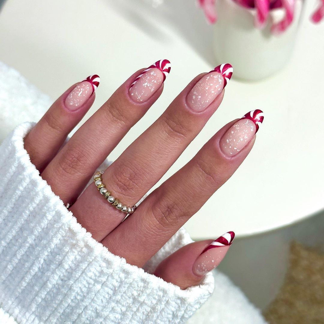 Candy Cane Stripe French Tip Almond Nails Candy Cane Stripe French Tip Almond Nails — Medium Christmas Nails 2026