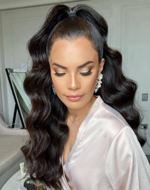 Voluminous Dark Brown Ponytail — Winter Wedding Guest Hairstyles