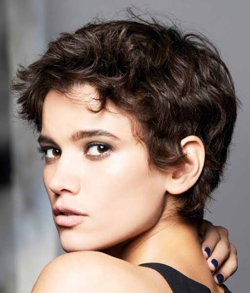 Dark Brown Curly Pixie With Side Bangs Dark Brown Curly Pixie With Side Bangs — Winter Hair Colors for Women Over 40