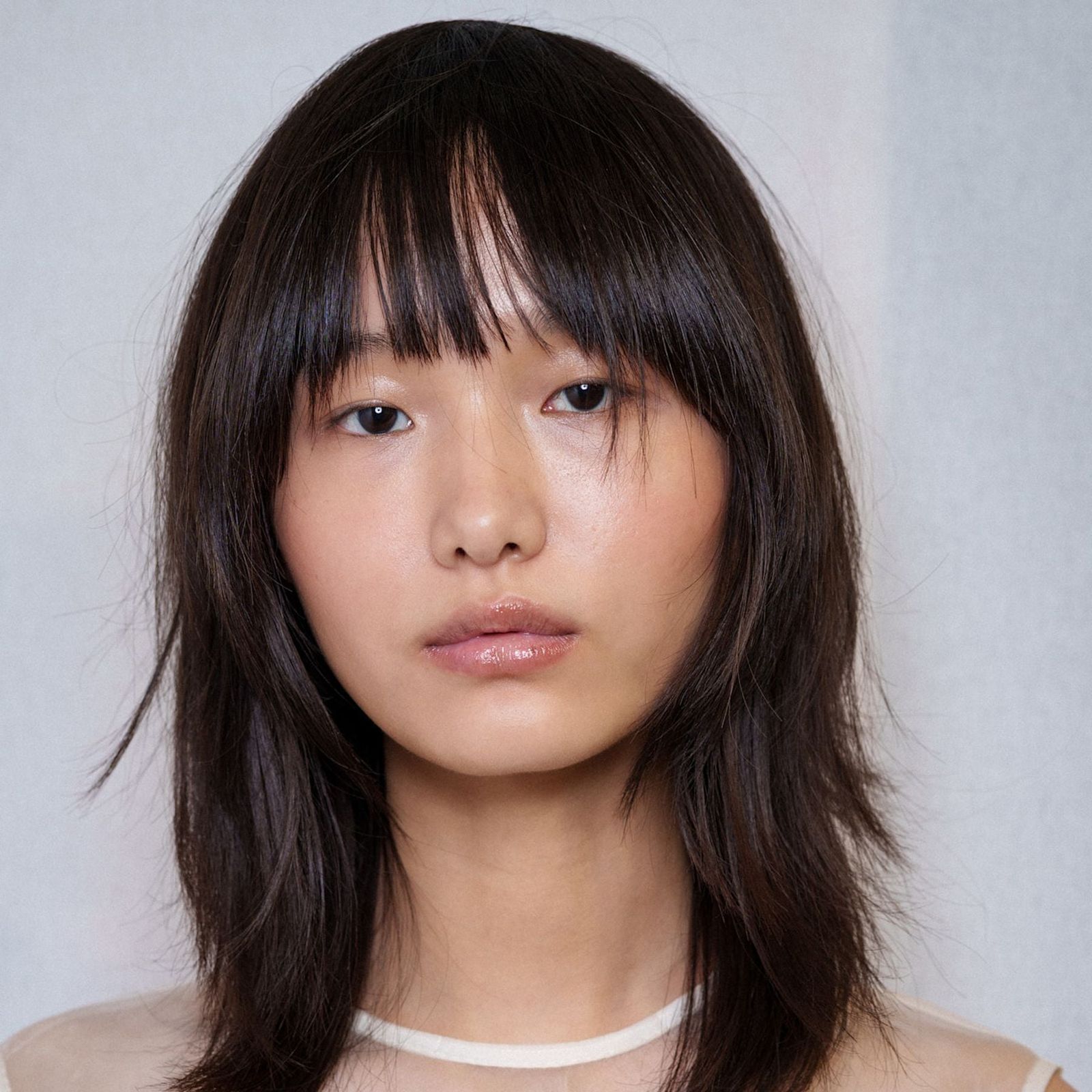 Dark Brown Shag With Blunt Bangs — Medium Length Winter Haircuts