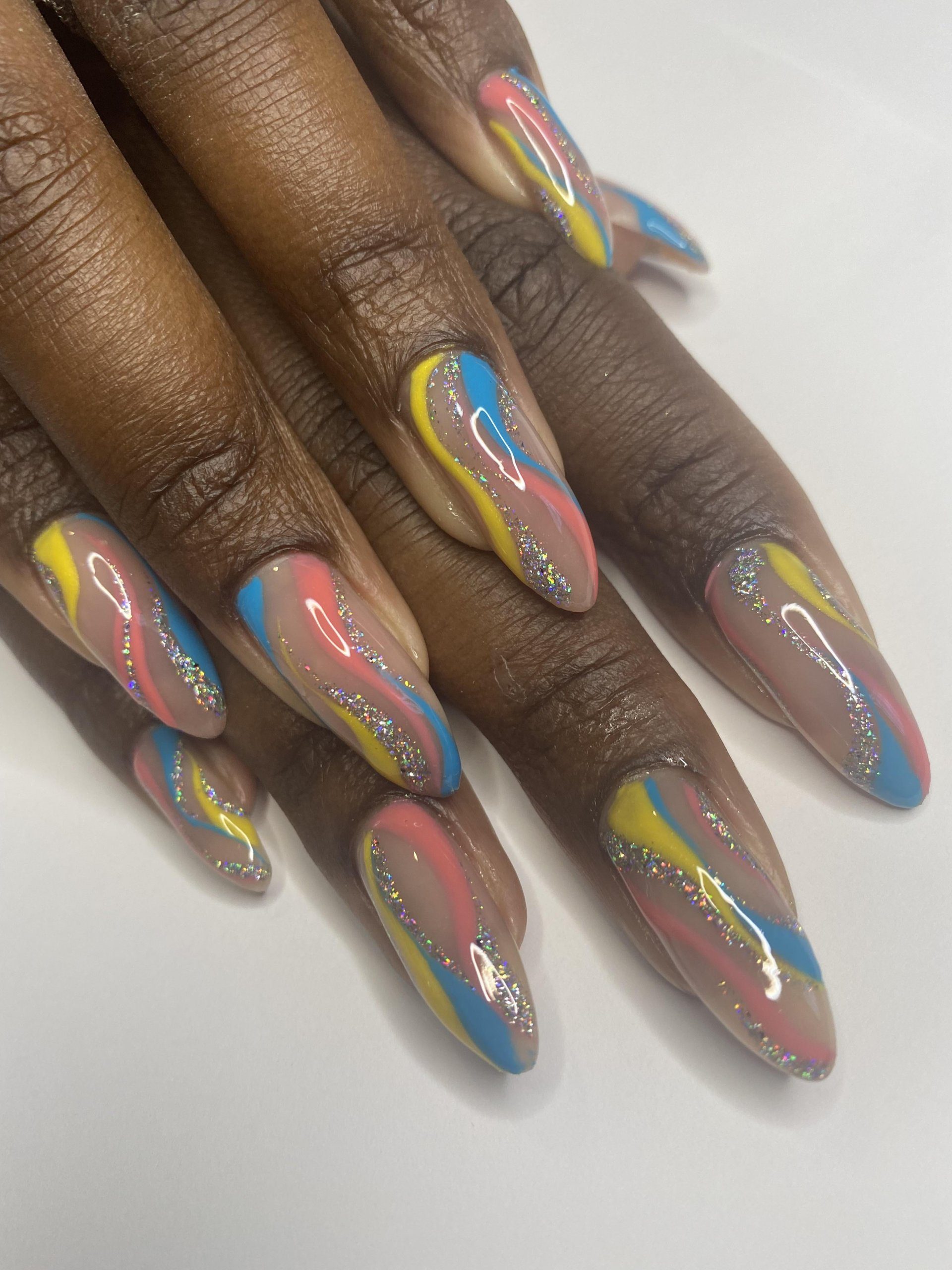 Vibrant Swirls and Glitter on Nude Vibrant Swirls and Glitter on Nude — Winter Nails for Black Women