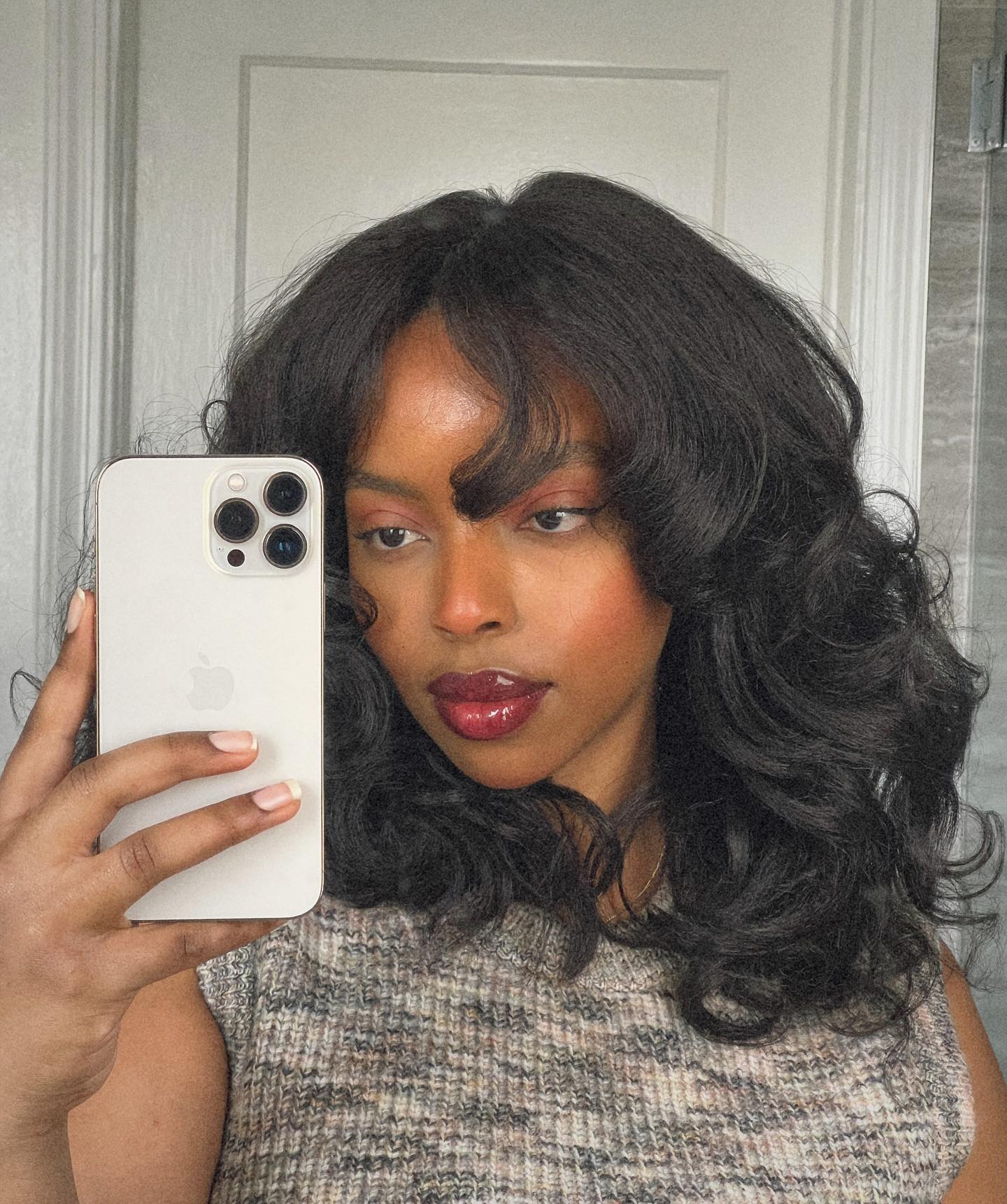 Voluminous Layered Bob With Curtain Bangs Voluminous Layered Bob With Curtain Bangs — Winter Haircuts for Black Women