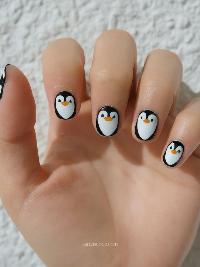 Penguin Art on Short Oval Nails Penguin Art on Short Oval Nails — Winter Nails for School