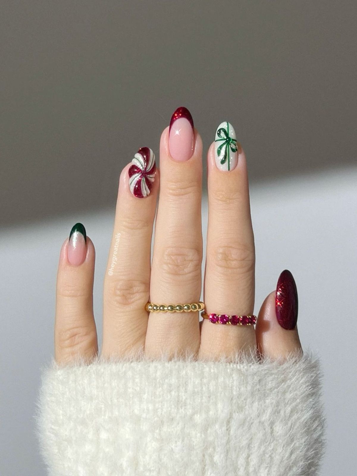 Festive Art Nude Base Almonds Festive Art Nude Base Almonds — Red and Green Christmas Nails 2026