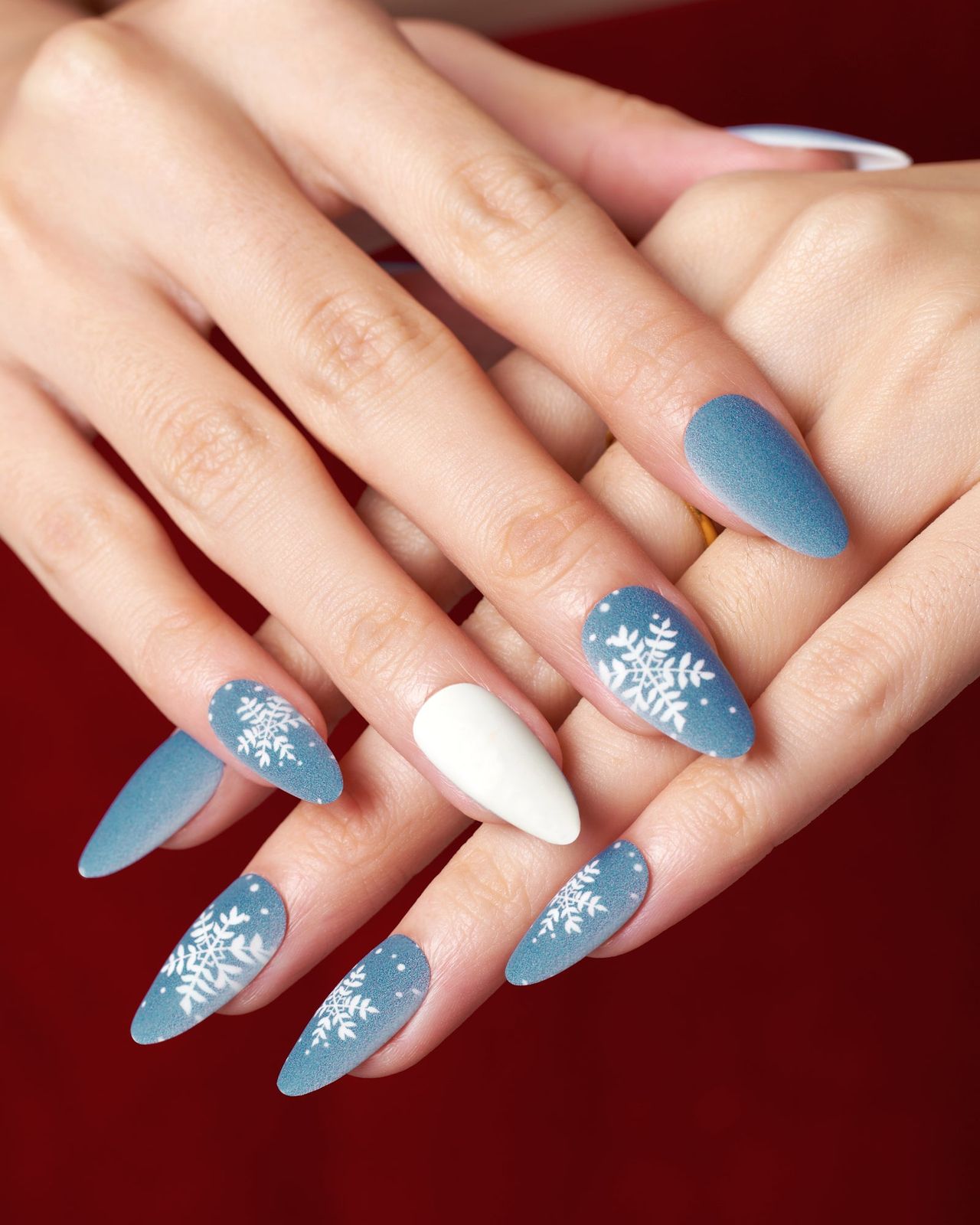 Matte Blue Snowflake Stiletto Nails Matte Blue Snowflake Stiletto Nails — Christmas Almond Nails 2026
