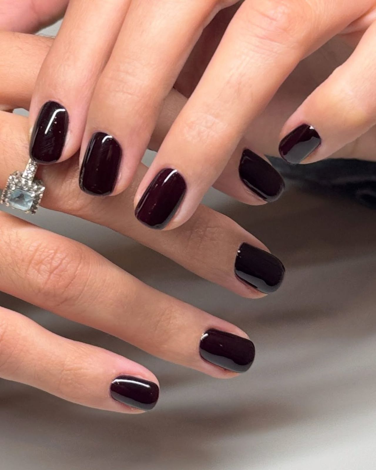 Deep Brown Red-Toned Glossy Nails Deep Brown Red-Toned Glossy Nails — Winter Nail Colors for Women Over 70