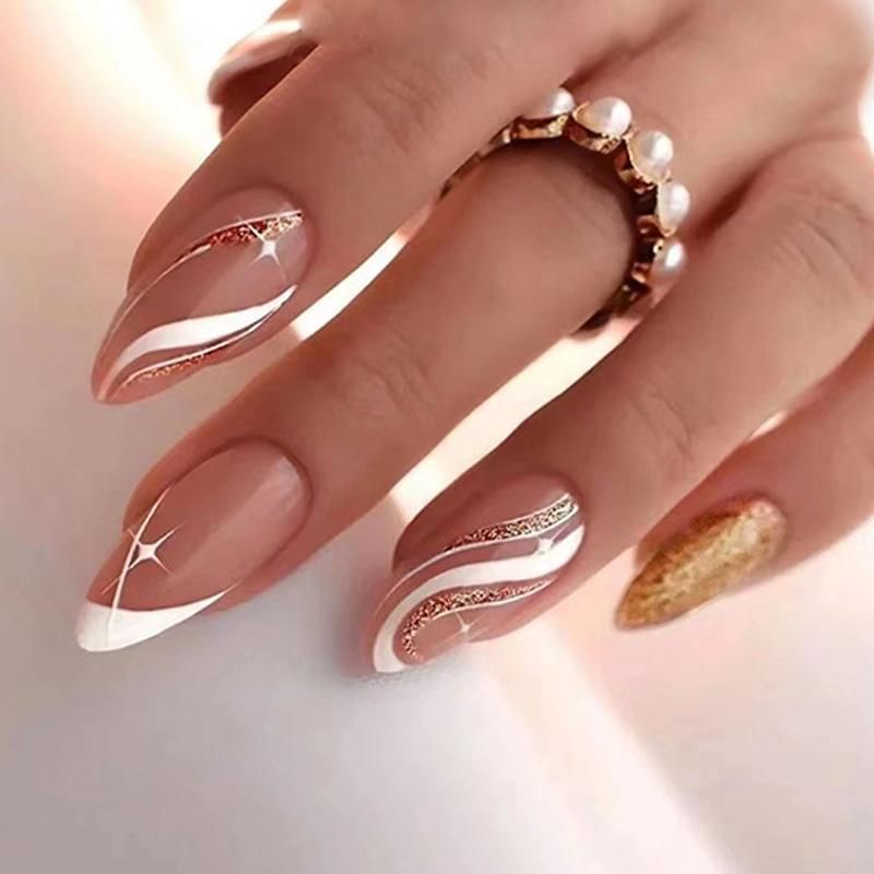 Nude With White Gold Wavy Lines Glitter Nude With White Gold Wavy Lines Glitter — Medium Winter Almond Nails