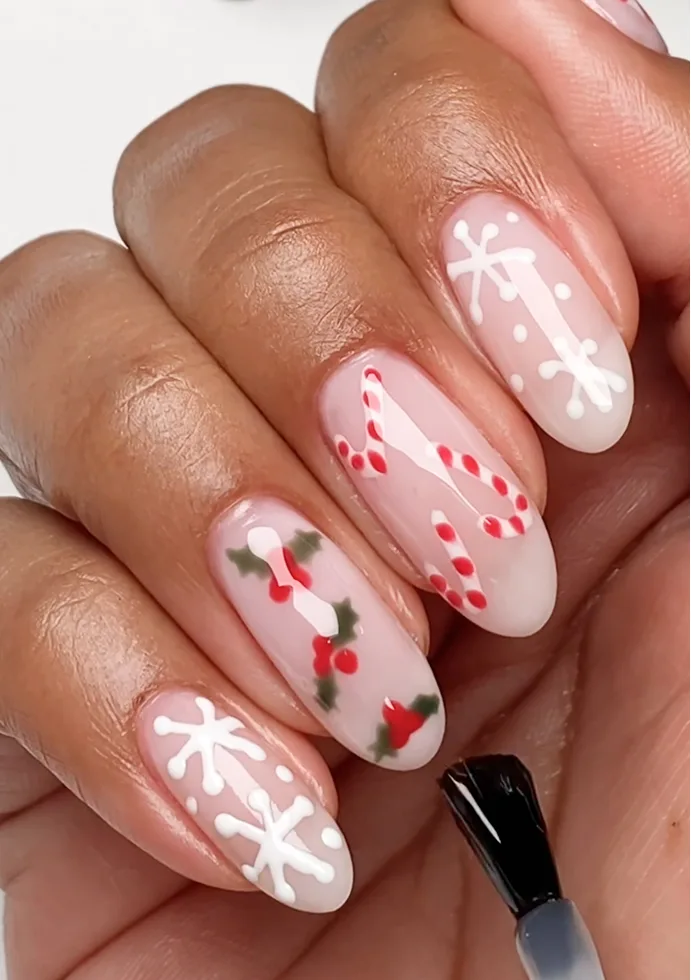 Delicate Christmas Motif Short Oval Nails Delicate Christmas Motif Short Oval Nails — Christmas Nail Trends 2026