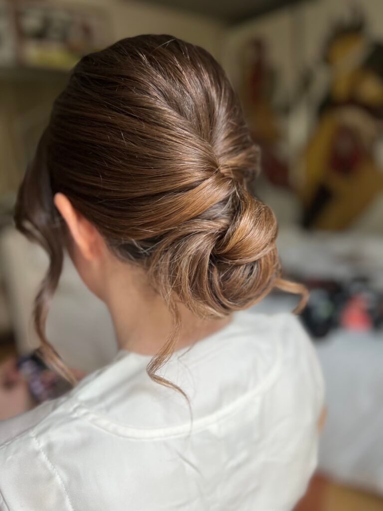 Sleek Low Twisted Bun Brunette Sleek Low Twisted Bun Brunette — Winter Updos