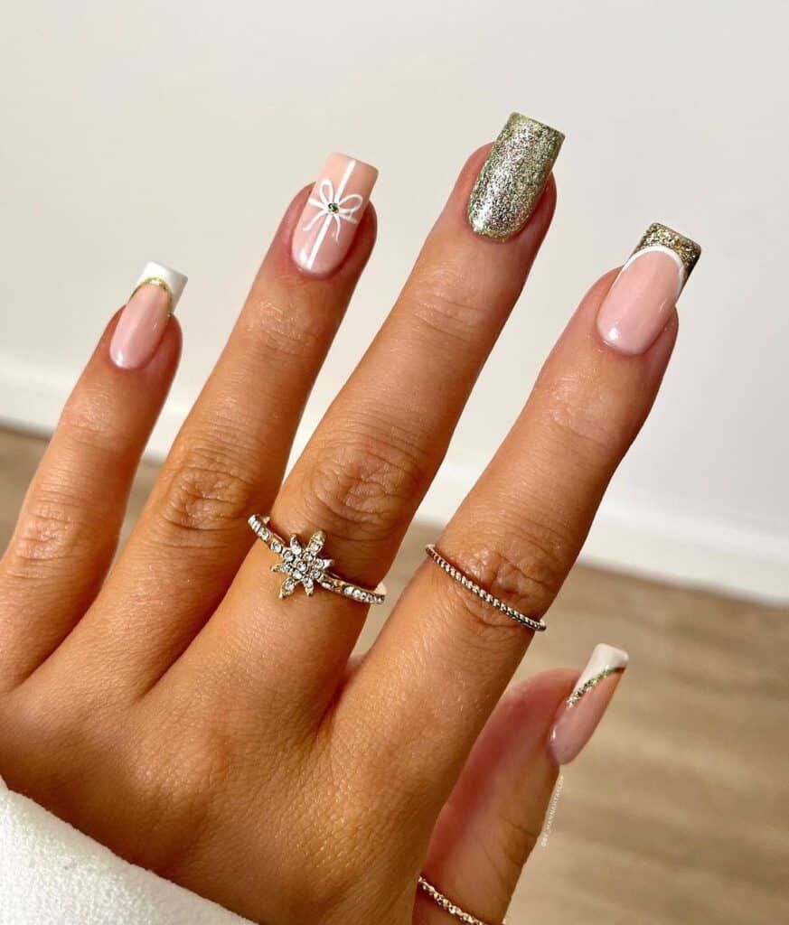 Nude Base Gold Glitter French Tips Nude Base Gold Glitter French Tips — Short Christmas Coffin Nails 2026