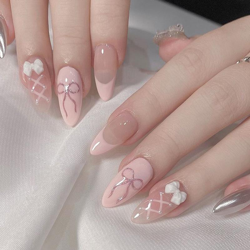 Mixed Finish Almonds: 3D Bows and Silver Mixed Finish Almonds: 3D Bows and Silver — Winter Bow Nails