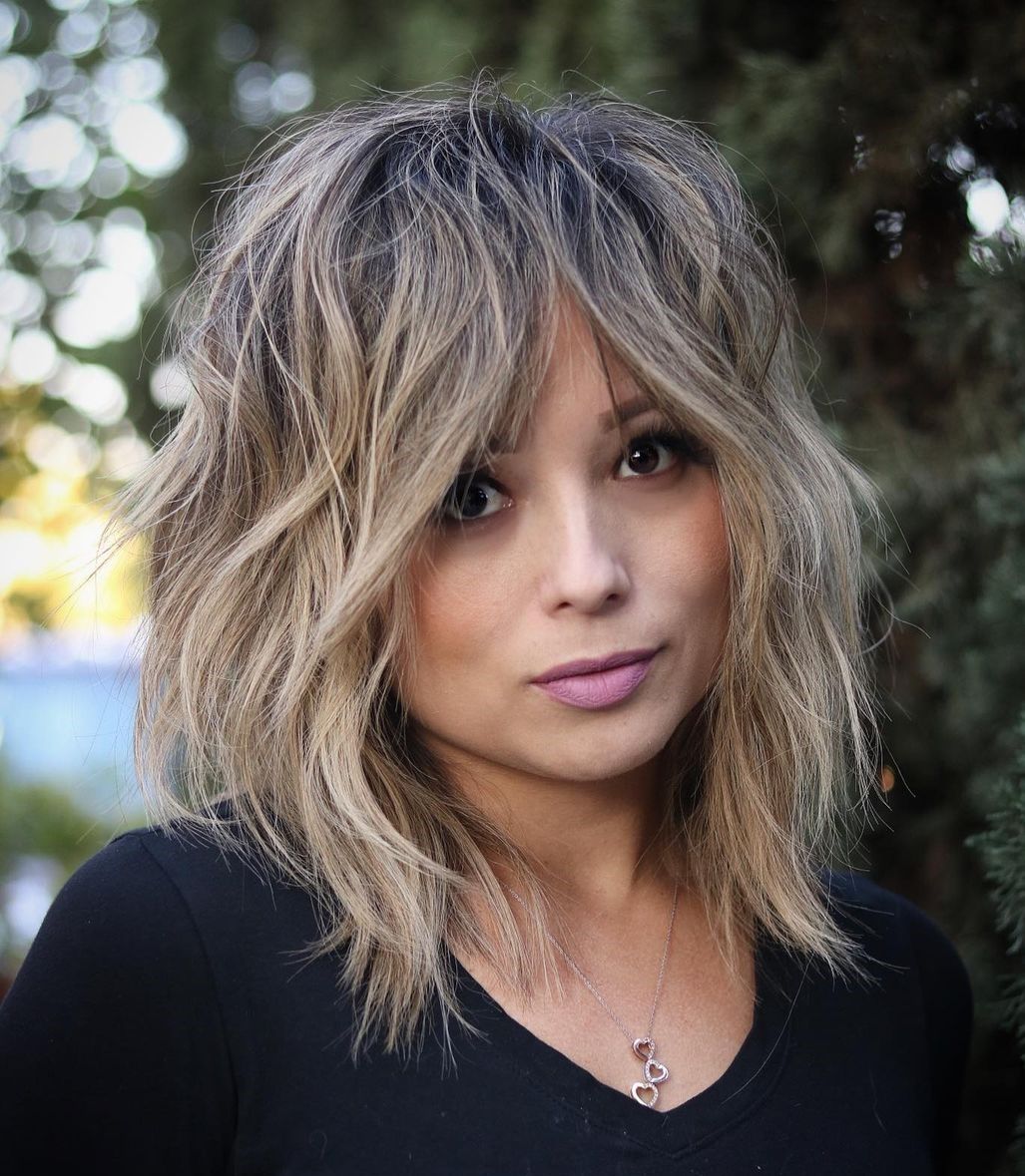 Collarbone Shag with Curtain Bangs Collarbone Shag with Curtain Bangs — Winter Haircuts for Thick Hair